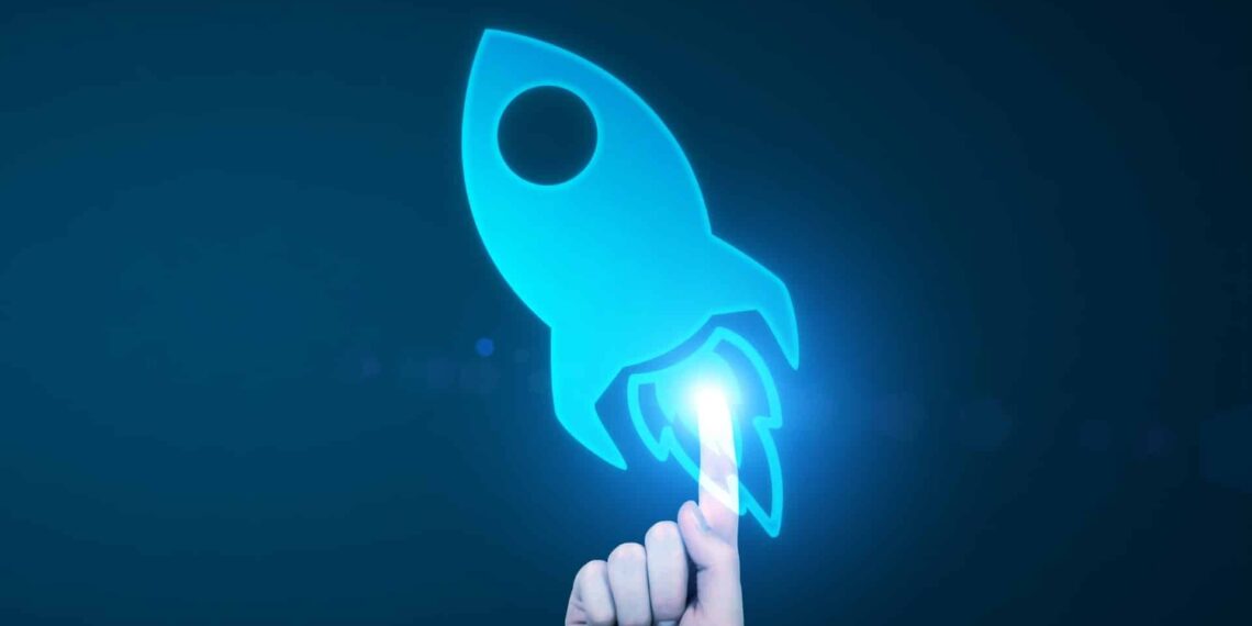 A hand pointing at a blue rocket icon on a dark background, symbolizing innovation or technology.