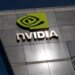 NVIDIA logo displayed on the exterior of a modern building with a reflective surface.