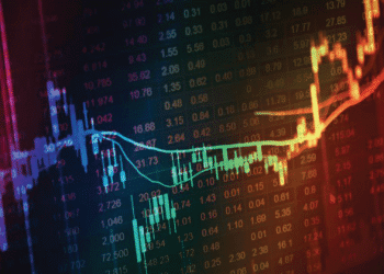 Colorful stock market data visualization showing fluctuating prices and trends on a digital display.