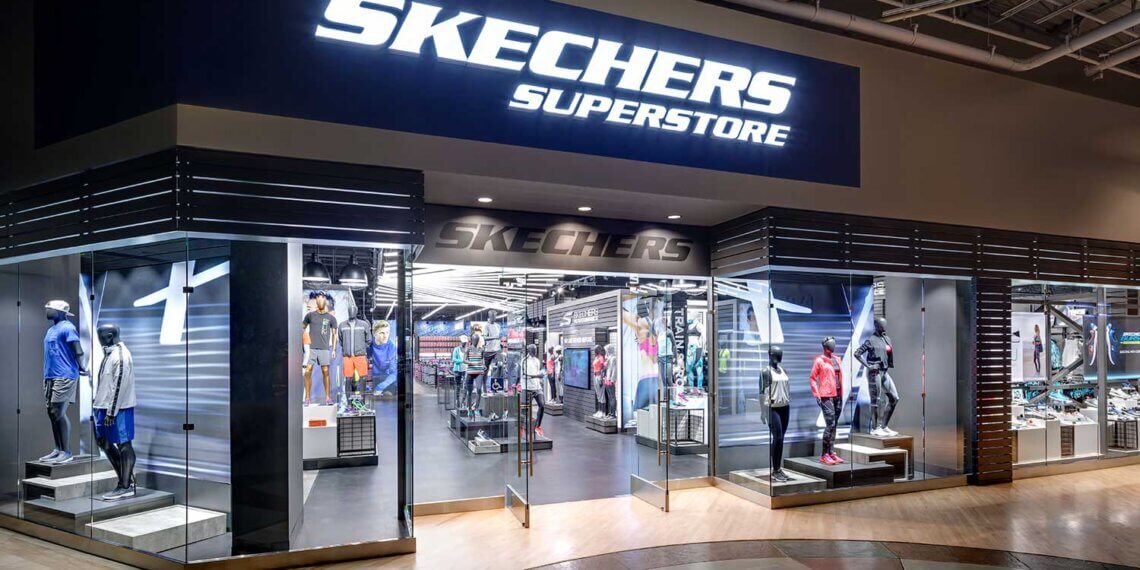 Exterior view of a Skechers superstore with large signage and display windows.