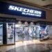 Exterior view of a Skechers superstore with large signage and display windows.