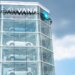 Carvana vehicle vending machine displaying multiple cars in a glass structure.