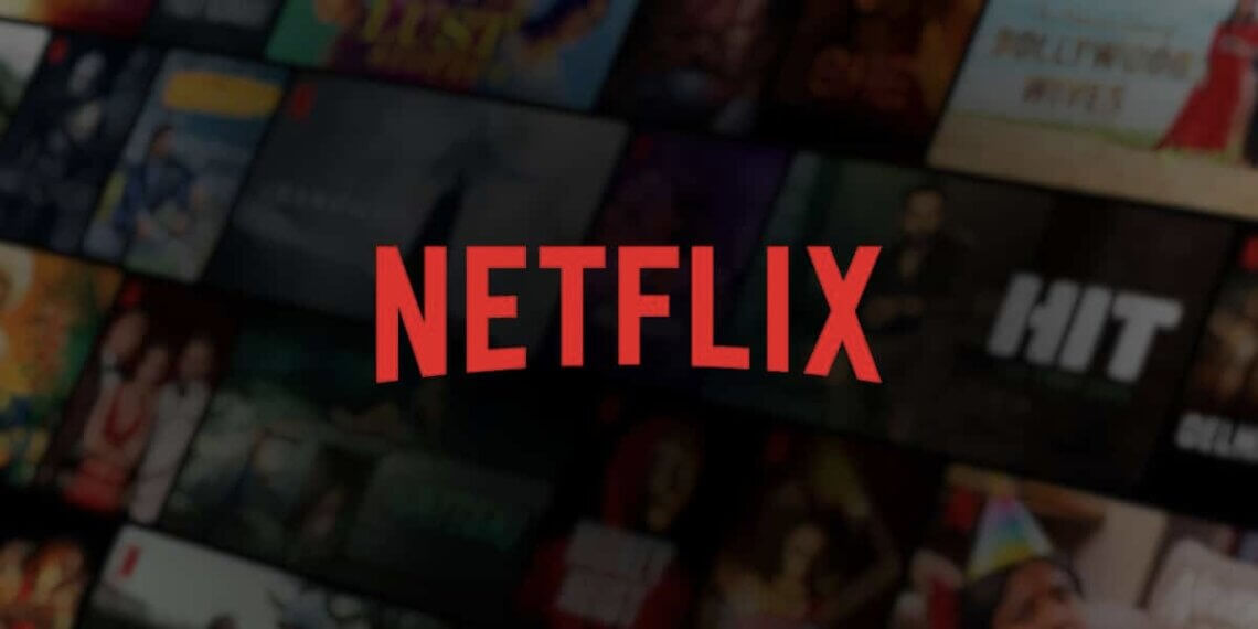 Netflix logo displayed prominently against a blurred background of various streaming content thumbnails.