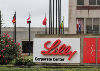 Sign for Lilly Corporate Center featuring the company name and chemical structure design.