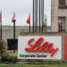 Sign for Lilly Corporate Center featuring the company name and chemical structure design.