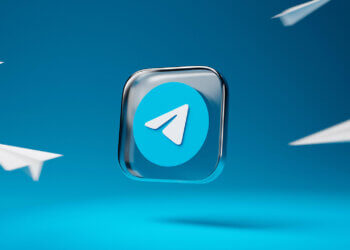 Telegram logo featuring a paper plane icon on a blue background with paper planes in motion.