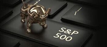 A golden bull figurine positioned on a black keyboard key labeled S&P 500.