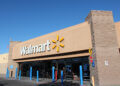 Exterior view of a Walmart store with the logo prominently displayed above the entrance.