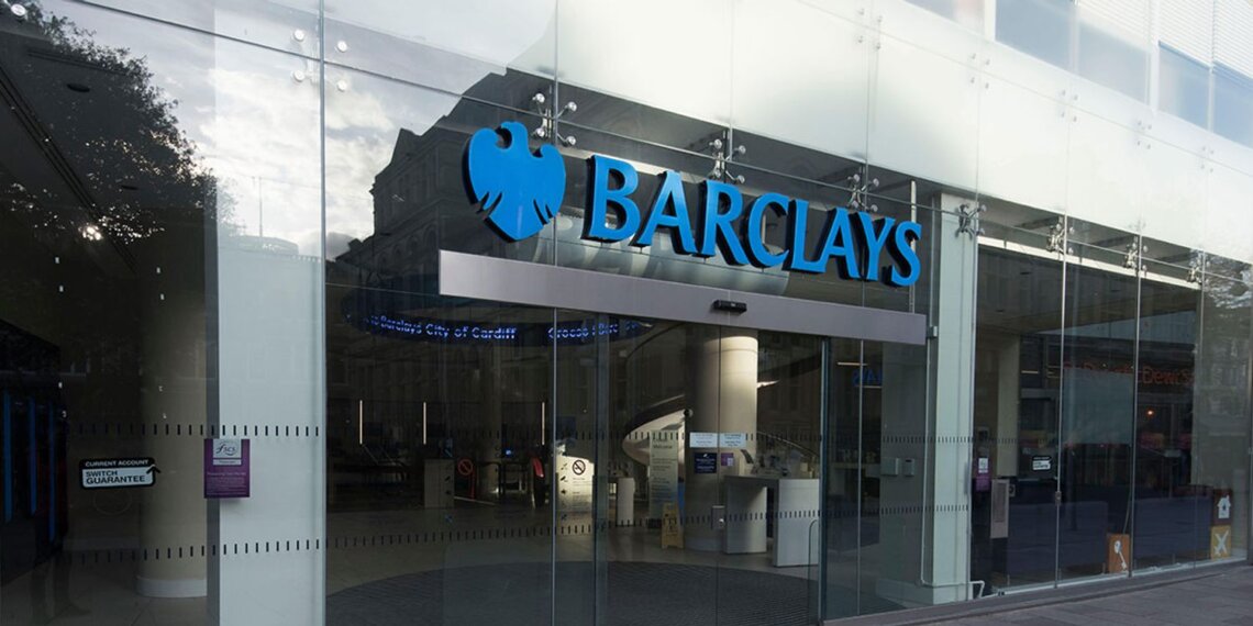 Entrance of a Barclays Bank branch featuring the logo and glass facade.