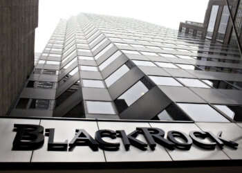 Exterior view of the BlackRock building with a focus on its glass facade and signage.