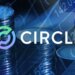 Circle logo displayed in front of stacks of coins and financial graphs.