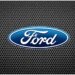 Ford logo displayed on a textured black background with a honeycomb pattern.