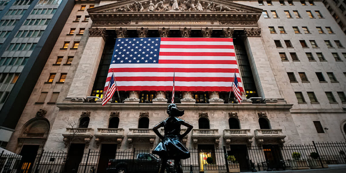 New York Stock Exchange building featuring a large American flag and a bronze statue of a girl in front.