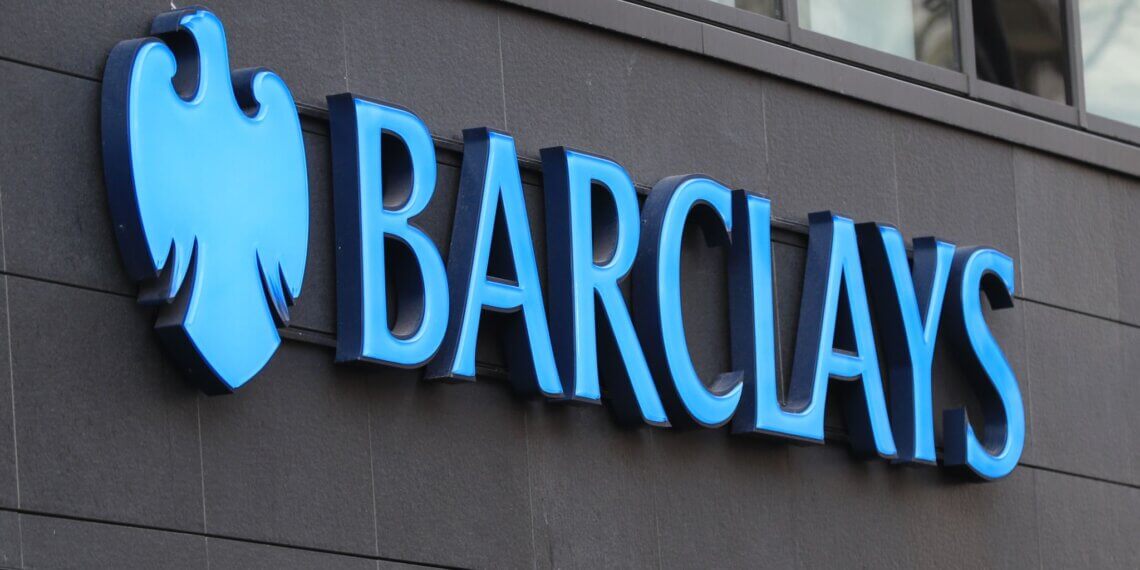 Blue Barclays logo displayed on a building exterior with a shield emblem.