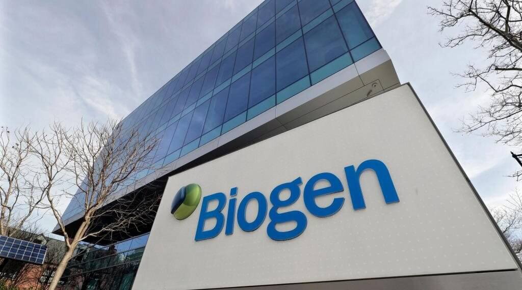 Exterior view of the Biogen corporate building with a prominent sign displaying the company name.