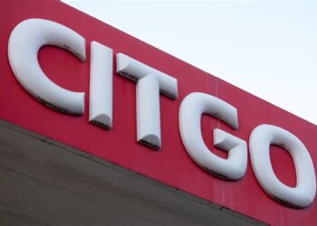 Close-up view of the Citgo logo on a red background at a gas station.