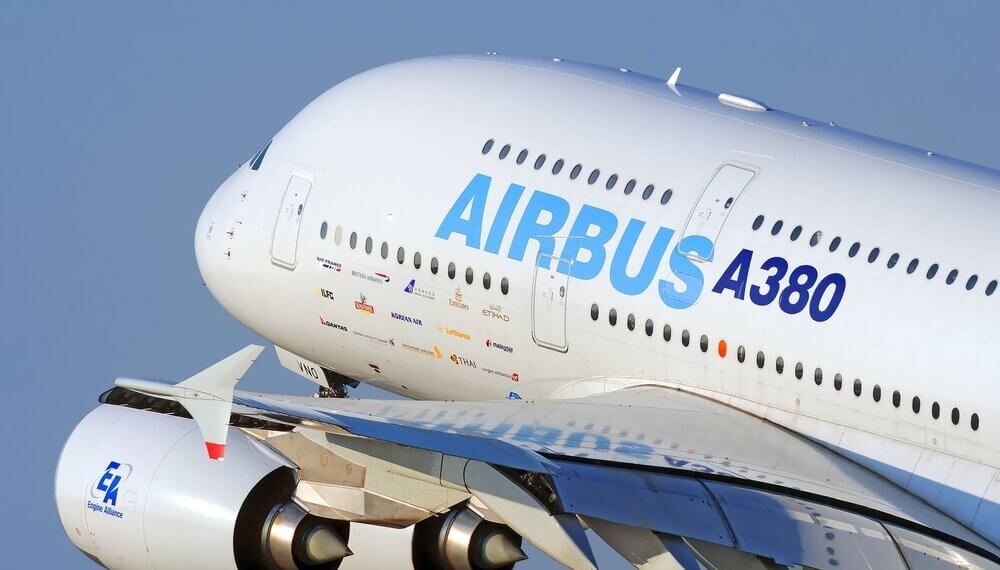 Close-up view of an Airbus A380 aircraft showcasing its nose and engine.
