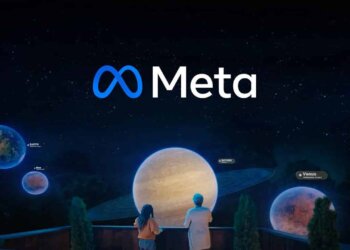 Two individuals observing a planetary visualization with the Meta logo displayed prominently above.