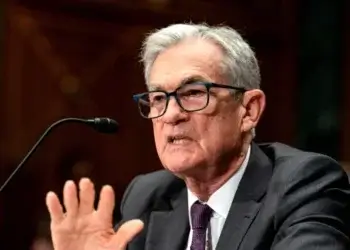 Jerome Powell speaking into a microphone during a congressional hearing.