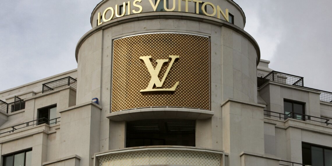 Exterior view of a Louis Vuitton store featuring the brand's logo and signage.
