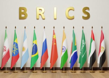 Flags of BRICS countries including Brazil, Russia, India, China, and South Africa arranged in a row.