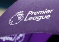 Purple umbrella featuring the Premier League logo with a lion and text.