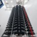 A vertical arrangement of Starlink V2 Mini satellites in a storage facility.