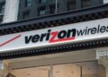 Verizon Wireless store logo displayed on a storefront sign with a red checkmark.