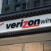 Verizon Wireless store logo displayed on a storefront sign with a red checkmark.