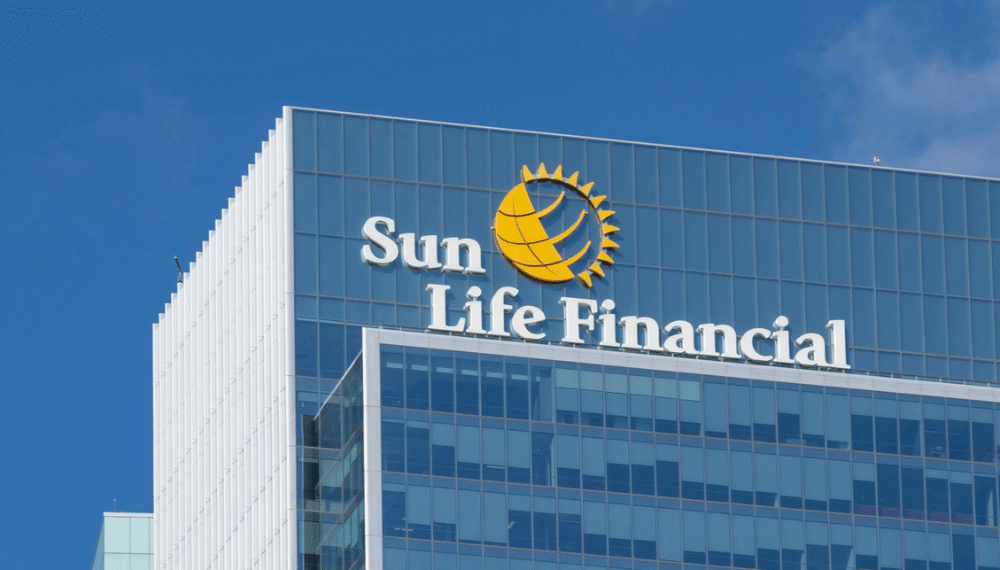 Sun Life Financial logo displayed on the exterior of a modern glass building.