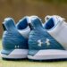 Close-up view of the back of Under Armour HOVR Drive spikeless golf shoes in blue and white.