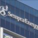 Sempra Energy logo displayed on the exterior of a modern glass building.